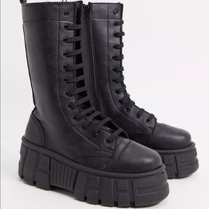 Chunky leather lace up boot.  Rubber bottoms.